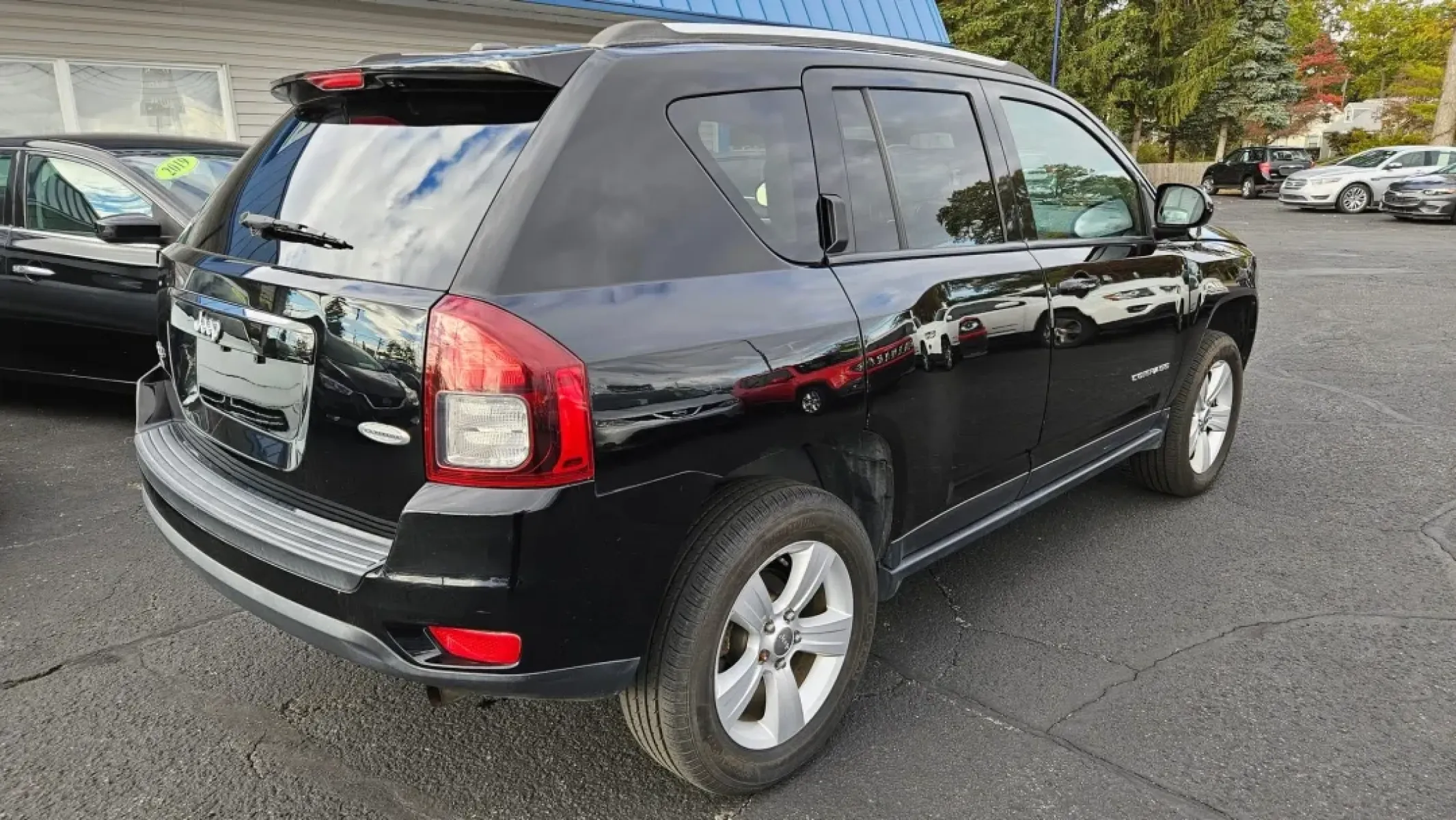 2016 BLACK Jeep Compass (1C4NJDEB6GD) with an Other engine, located at 5744 Central Avenue, Toledo, OH, 43615, (419) 724-0130, 41.676781, -83.682137 - **Adventure Awaits: 2016 Jeep Compass Your Perfect Companion for Life's Journeys**<br /> <br /> Are you ready to elevate your lifestyle with a vehicle that can handle everything from daily commutes to weekend getaways? Look no further than this versatile 2016 Jeep Compass, designed for those who cr - Photo#3