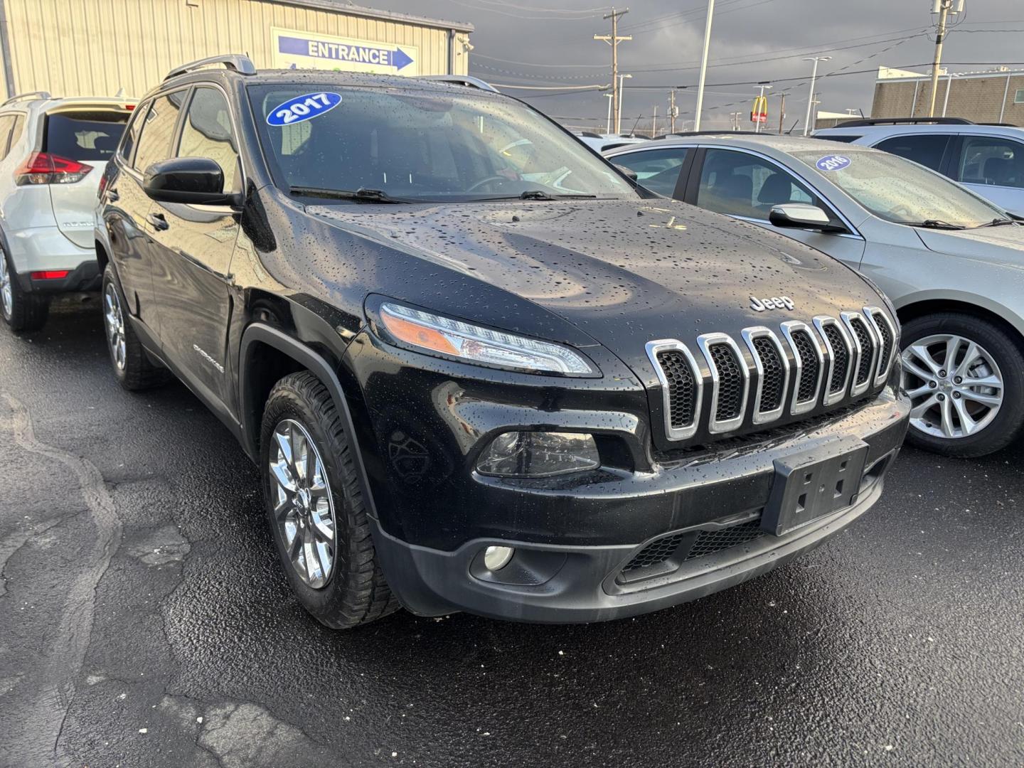 2017 BLACK Jeep CHEROKEE LATITUDE (1C4PJMCS4HW) with an Other engine, located at 100 West Coliseum Boulevard, Fort Wayne, IN, 46805, (260) 471-0567, 41.119961, -85.140312 - 2017 Jeep CHEROKEE LATITUDE - Photo#0