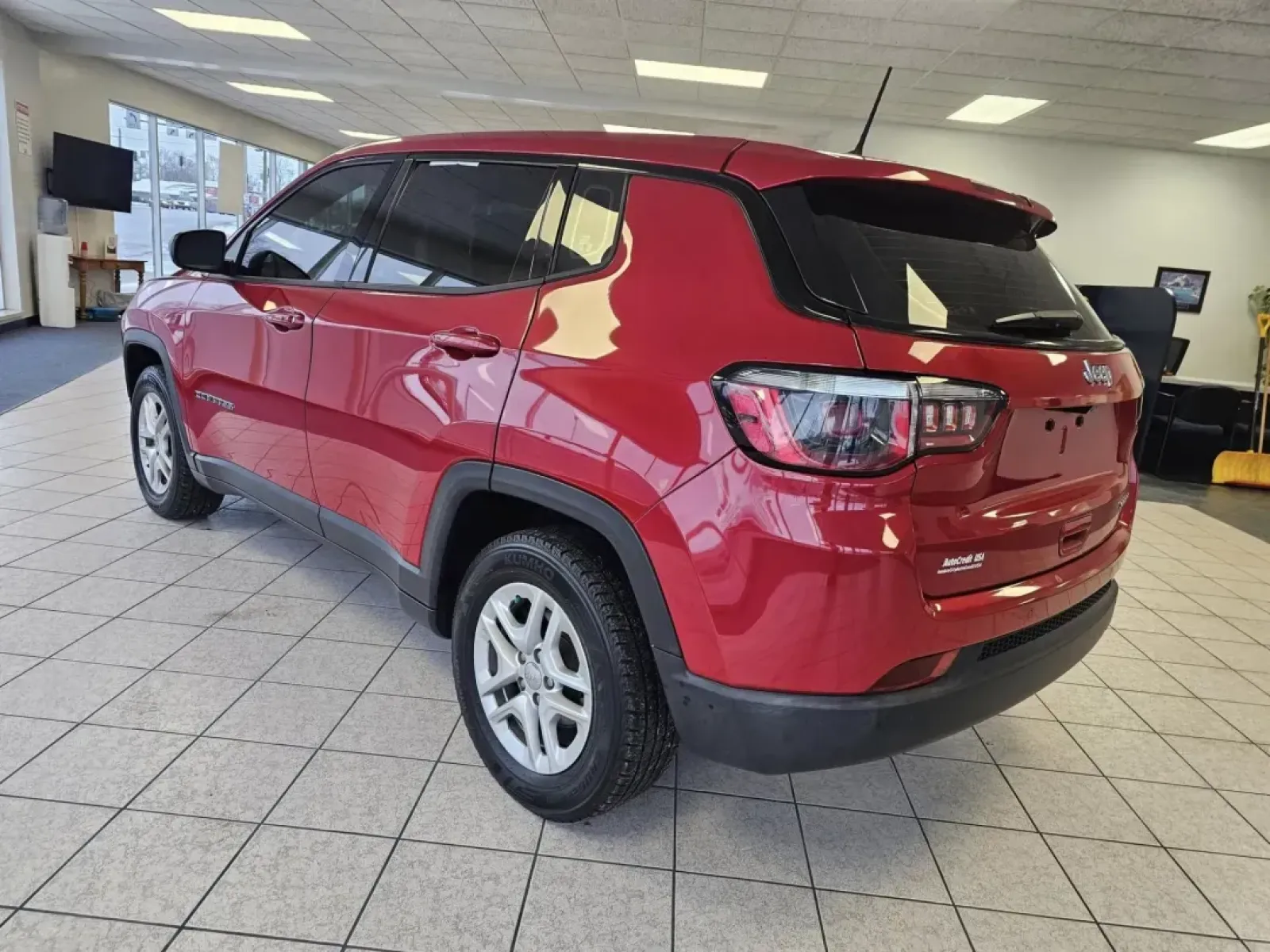2018 RED Jeep COMPASS SPORT (3C4NJCAB7JT) with an Other engine, located at 502 South Main Street, Columbia City, IN, 46725, (260) 244-4645, 41.151382, -85.490578 - **Unlock Your Adventurous Spirit with the 2018 Jeep Compass Sport!**<br /> <br /> Are you ready to elevate your daily commute or embark on weekend getaways? Discover the perfect blend of style, versatility, and functionality with the 2018 Jeep Compass Sport, now available at Auto Credit in Toledo, O - Photo#3