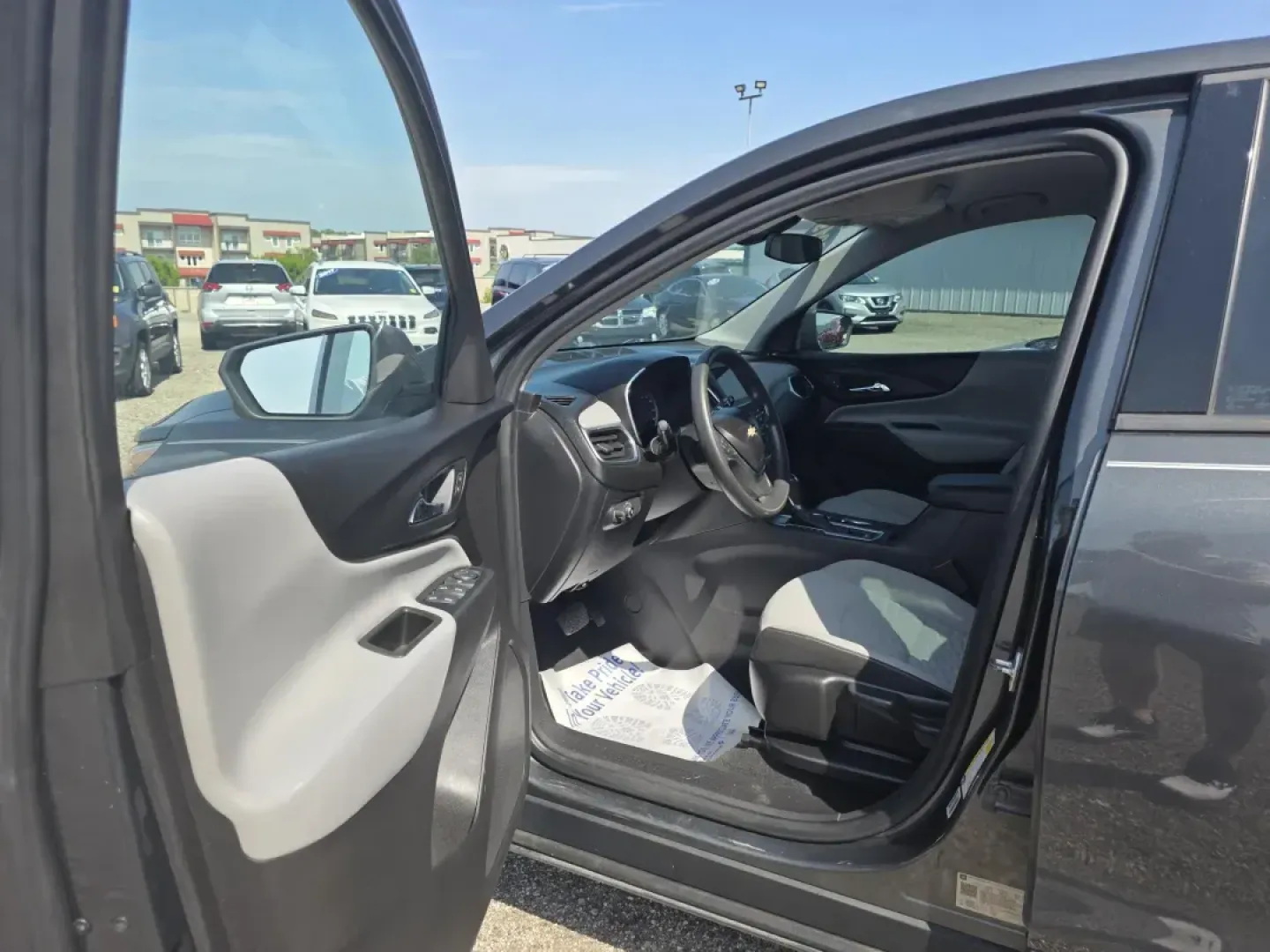 2019 Chevrolet EQUINOX LS (3GNAXHEV9KS) with an Other engine, located at 15 Petro Dr, Warsaw, IN, 46582, (574) 306-0055, 41.273563, -85.857544 - Are you seeking a versatile vehicle that can seamlessly transition from daily commutes to family road trips? Look no further than this 2019 Chevrolet Equinox LS! Perfect for busy families or individuals who crave adventure, this grey 4-door wagon combines practicality with style, ensuring you and yo - Photo#2