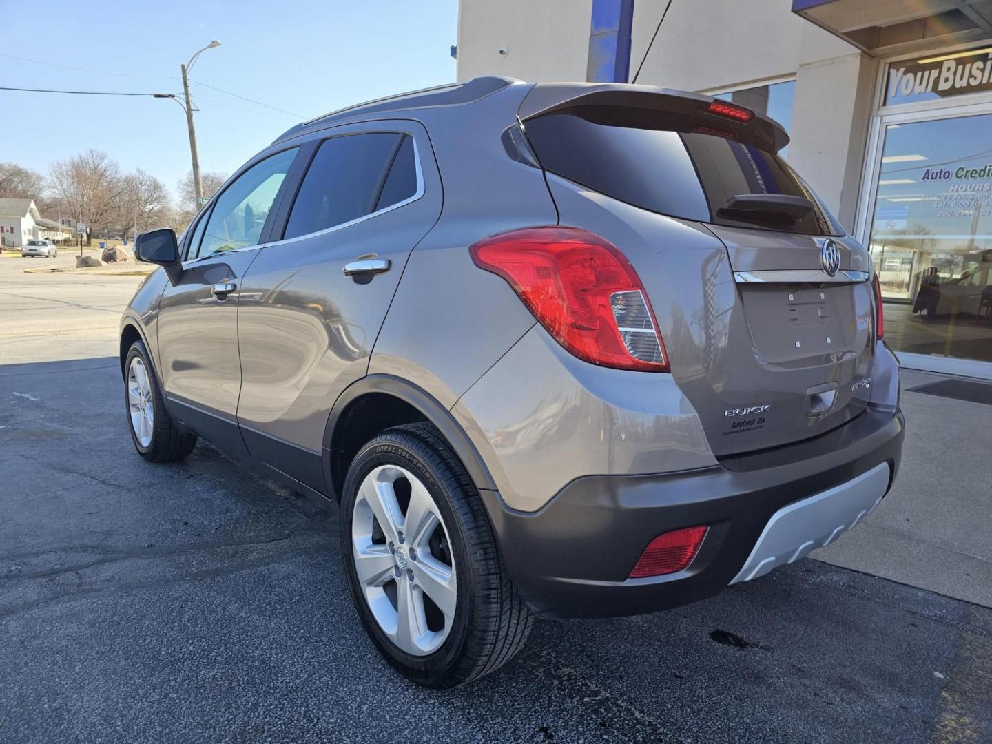 2015 GOLD Buick ENCORE LEATHER (KL4CJGSB8FB) with an Other engine, located at 502 South Main Street, Columbia City, IN, 46725, (260) 244-4645, 41.151382, -85.490578 - Discover the perfect blend of style, comfort, and versatility with the 2015 Buick Encore Leather, an SUV that's great for growing families and ideal for weekend adventures around Columbia City. Whether you're navigating the bustling streets of downtown or venturing into the beautiful Indiana country - Photo#3