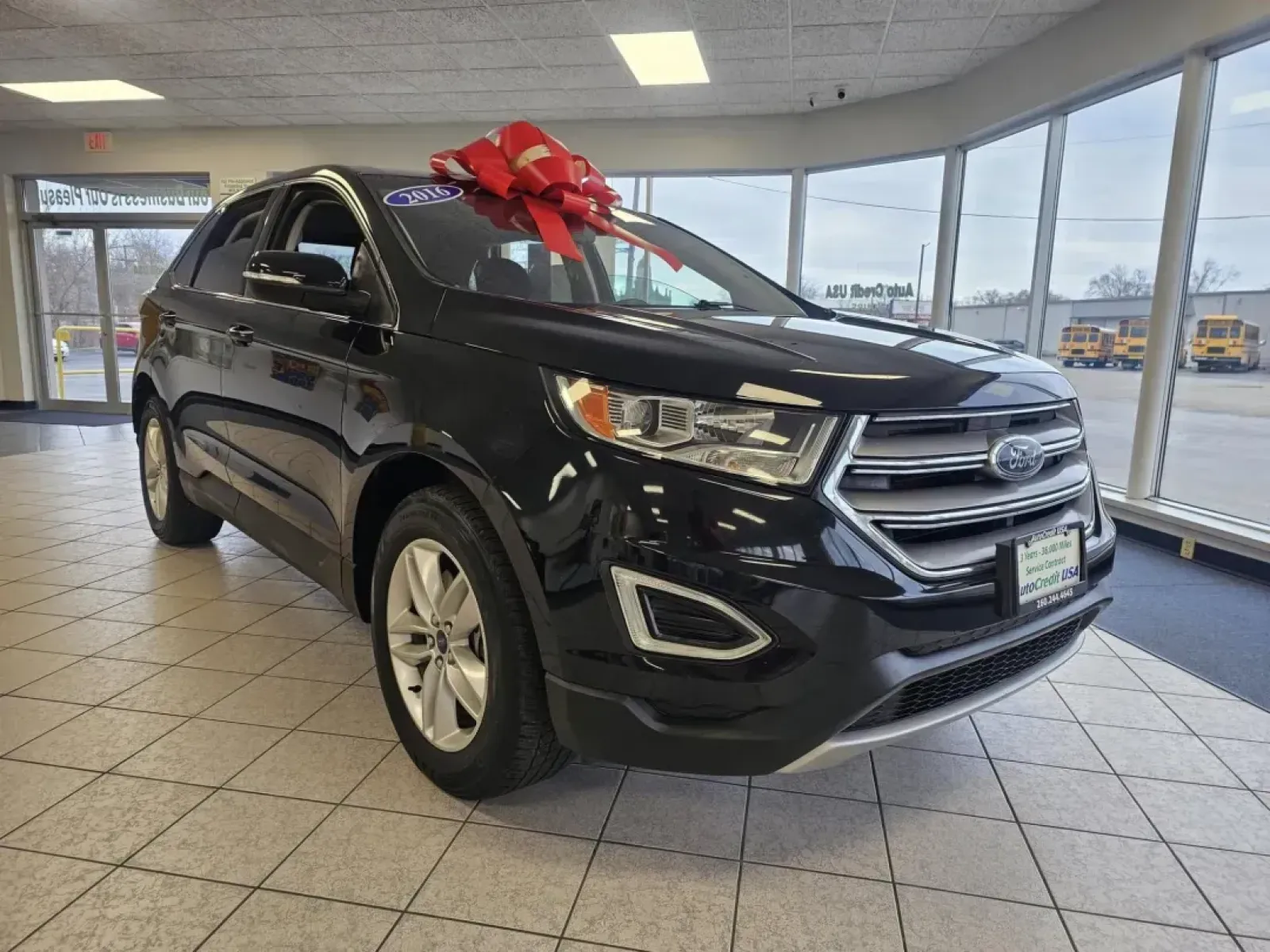 2016 BLACK /Black Ford Edge SEL AWD (2FMPK4J99GB) with an 2.0L L4 DOHC 16V engine, 6A transmission, located at 502 South Main Street, Columbia City, IN, 46725, (260) 244-4645, 41.151382, -85.490578 - 2016 Ford Edge SEL AWD - Photo#1