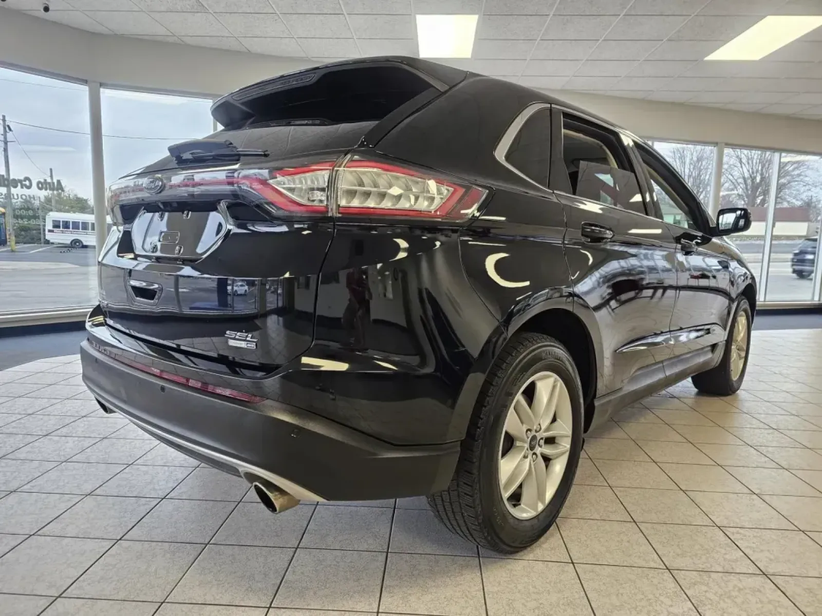 2016 BLACK /Black Ford Edge SEL AWD (2FMPK4J99GB) with an 2.0L L4 DOHC 16V engine, 6A transmission, located at 502 South Main Street, Columbia City, IN, 46725, (260) 244-4645, 41.151382, -85.490578 - 2016 Ford Edge SEL AWD - Photo#2