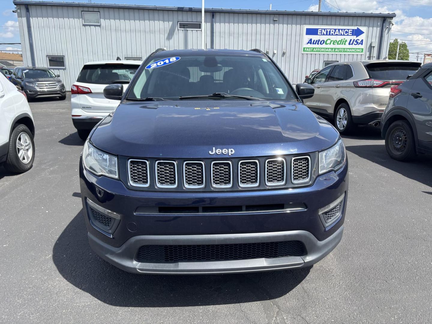 2018 Jeep Compass (3C4NJCAB8JT) with an Other engine, located at 100 West Coliseum Boulevard, Fort Wayne, IN, 46805, (260) 471-0567, 41.119961, -85.140312 - **Discover Adventure with this 2018 Jeep Compass Sport at Auto Credit in Fort Wayne, IN!**<br /> <br /> Are you ready to take your family on unforgettable weekend adventures or tackle daily commutes with style? The 2018 Jeep Compass Sport is the perfect companion for those who crave both functionali - Photo#1