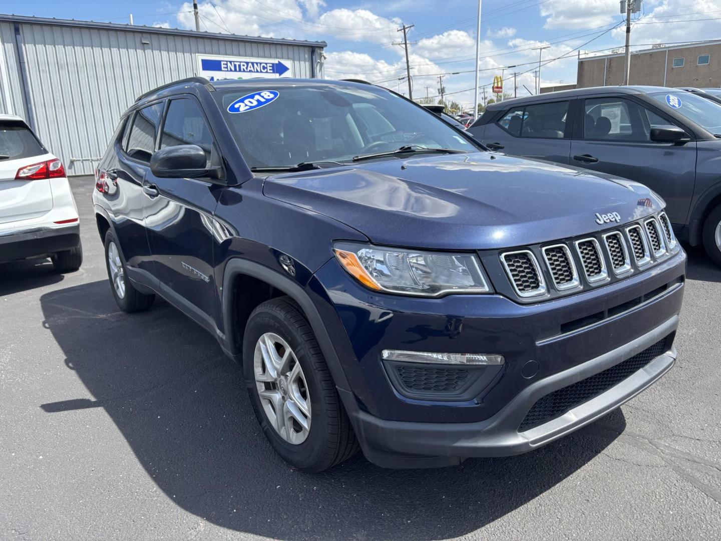 2018 Jeep Compass (3C4NJCAB8JT) with an Other engine, located at 100 West Coliseum Boulevard, Fort Wayne, IN, 46805, (260) 471-0567, 41.119961, -85.140312 - **Discover Adventure with this 2018 Jeep Compass Sport at Auto Credit in Fort Wayne, IN!**<br /> <br /> Are you ready to take your family on unforgettable weekend adventures or tackle daily commutes with style? The 2018 Jeep Compass Sport is the perfect companion for those who crave both functionali - Photo#0