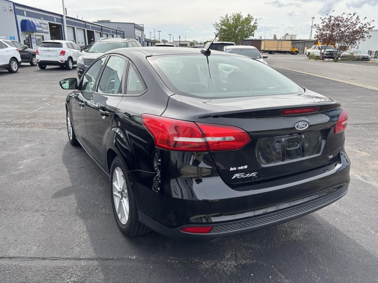 2018 BLACK Ford FOCUS SE (1FADP3F28JL) with an Other engine, located at 100 West Coliseum Boulevard, Fort Wayne, IN, 46805, (260) 471-0567, 41.119961, -85.140312 - **Discover Your Next Adventure with the 2018 Ford Focus SE at Auto Credit in Fort Wayne, IN!**<br /> <br /> Are you ready to elevate your daily commute or embark on weekend adventures? Look no further than the stunning 2018 Ford Focus SE, available now at Auto Credit, your trusted Buy Here Pay Here - Photo#3
