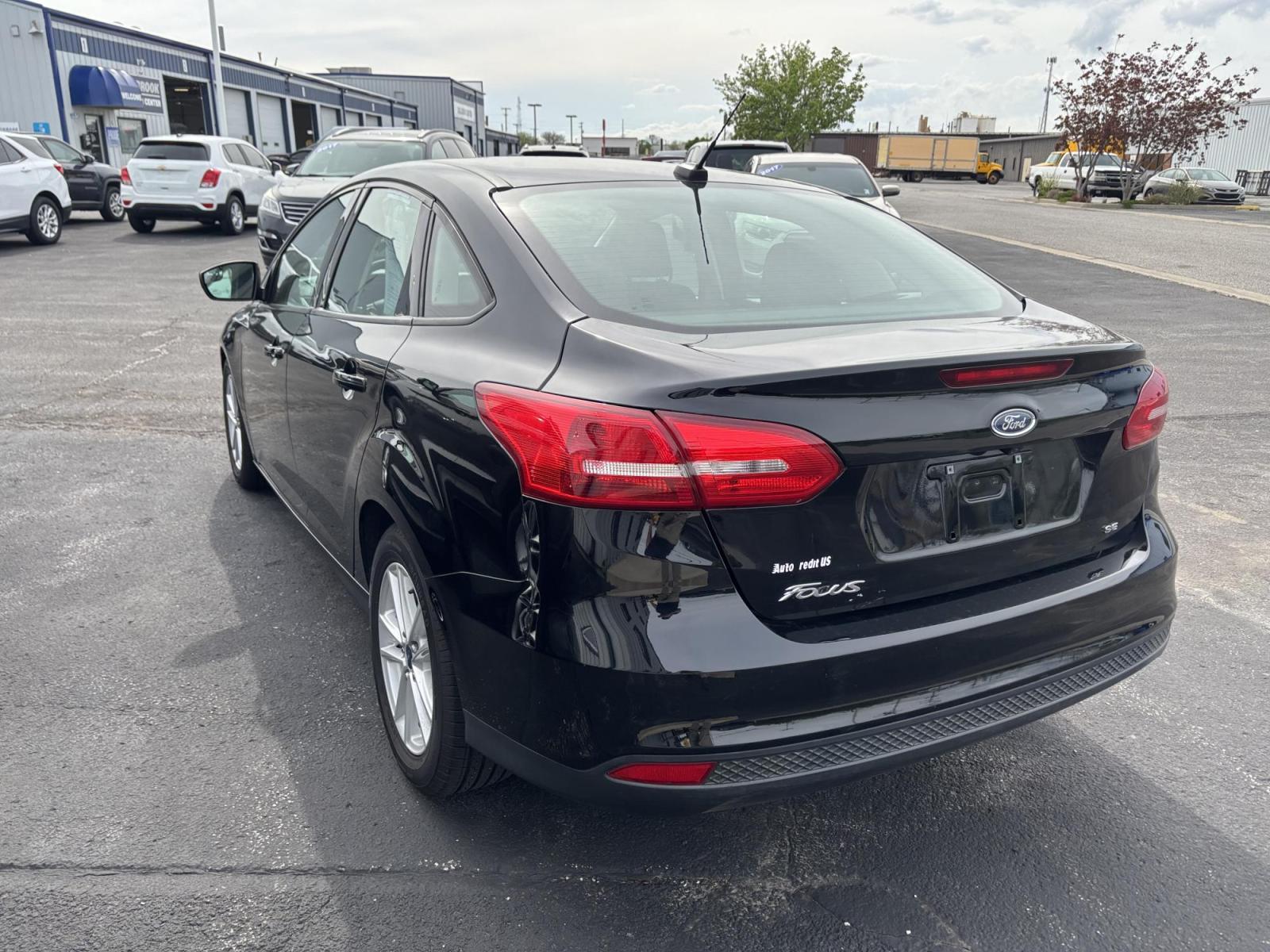 2018 BLACK Ford FOCUS SE (1FADP3F28JL) with an Other engine, located at 100 West Coliseum Boulevard, Fort Wayne, IN, 46805, (260) 471-0567, 41.119961, -85.140312 - 2018 Ford FOCUS SE - Photo#3