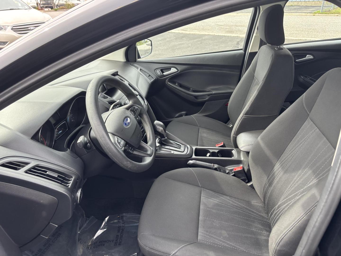 2018 BLACK Ford FOCUS SE (1FADP3F28JL) with an Other engine, located at 100 West Coliseum Boulevard, Fort Wayne, IN, 46805, (260) 471-0567, 41.119961, -85.140312 - **Discover Your Next Adventure with the 2018 Ford Focus SE at Auto Credit in Fort Wayne, IN!**<br /> <br /> Are you ready to elevate your daily commute or embark on weekend adventures? Look no further than the stunning 2018 Ford Focus SE, available now at Auto Credit, your trusted Buy Here Pay Here - Photo#6
