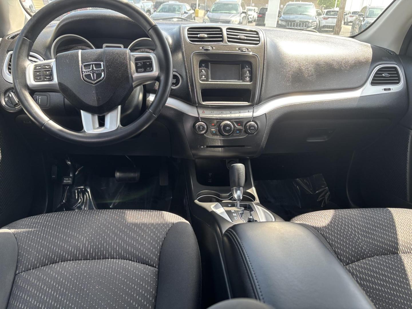 2018 Dodge Journey (3C4PDCAB2JT) with an Other engine, located at 100 West Coliseum Boulevard, Fort Wayne, IN, 46805, (260) 471-0567, 41.119961, -85.140312 - Are you ready to elevate your family's adventures with the perfect vehicle? Look no further than this 2018 Dodge Journey SE, a versatile 4-door wagon designed with your lifestyle in mind. Whether you're shuttling kids to school, heading to a weekend getaway, or navigating the bustling streets of For - Photo#4