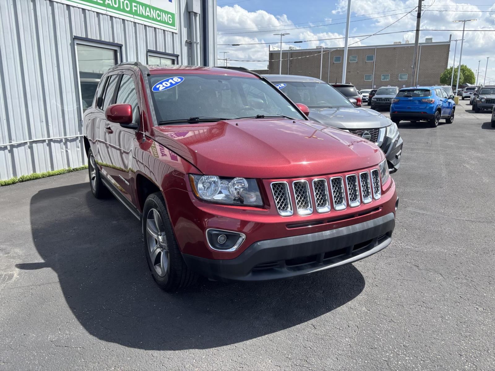 2016 RED Jeep COMPASS LATITUDE (1C4NJCEA0GD) with an Other engine, located at 100 West Coliseum Boulevard, Fort Wayne, IN, 46805, (260) 471-0567, 41.119961, -85.140312 - 2016 Jeep COMPASS LATITUDE - Photo#0
