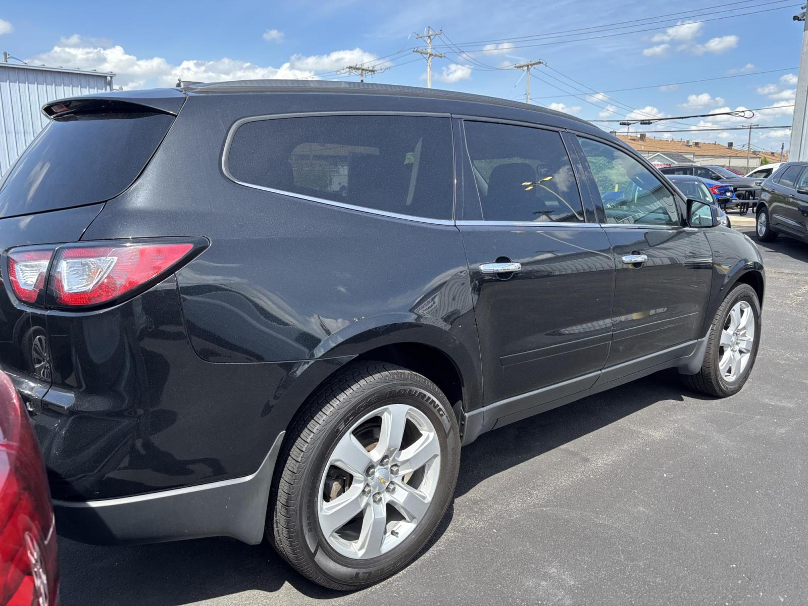 2017 BLACK Chevrolet TRAVERSE 1LT (1GNKVGKD8HJ) with an Other engine, located at 100 West Coliseum Boulevard, Fort Wayne, IN, 46805, (260) 471-0567, 41.119961, -85.140312 - 2017 Chevrolet TRAVERSE 1LT - Photo#3