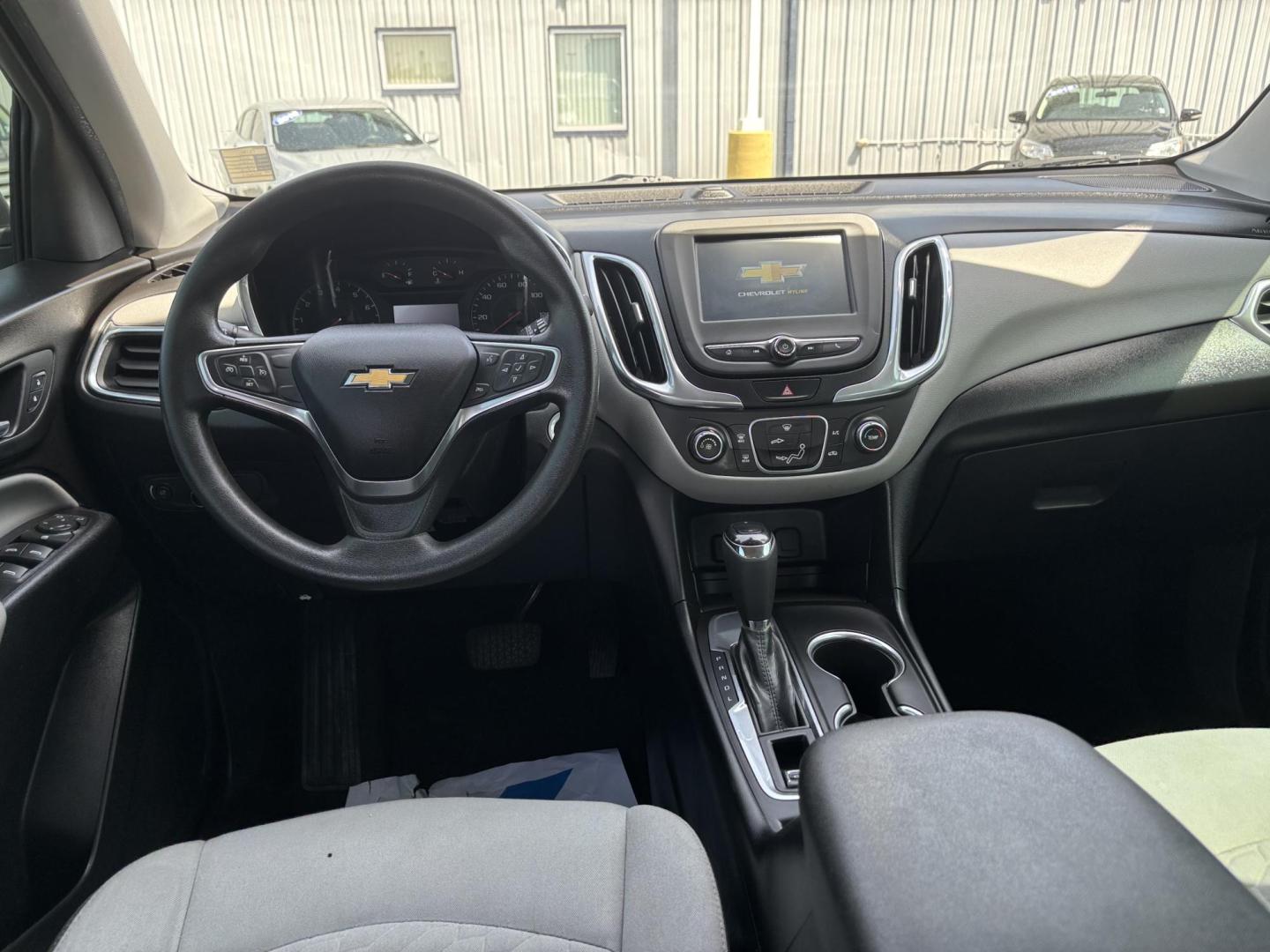 2018 WHITE Chevrolet EQUINOX LS (2GNAXHEV0J6) with an Other engine, located at 100 West Coliseum Boulevard, Fort Wayne, IN, 46805, (260) 471-0567, 41.119961, -85.140312 - 2018 Chevrolet EQUINOX LS - Photo#4