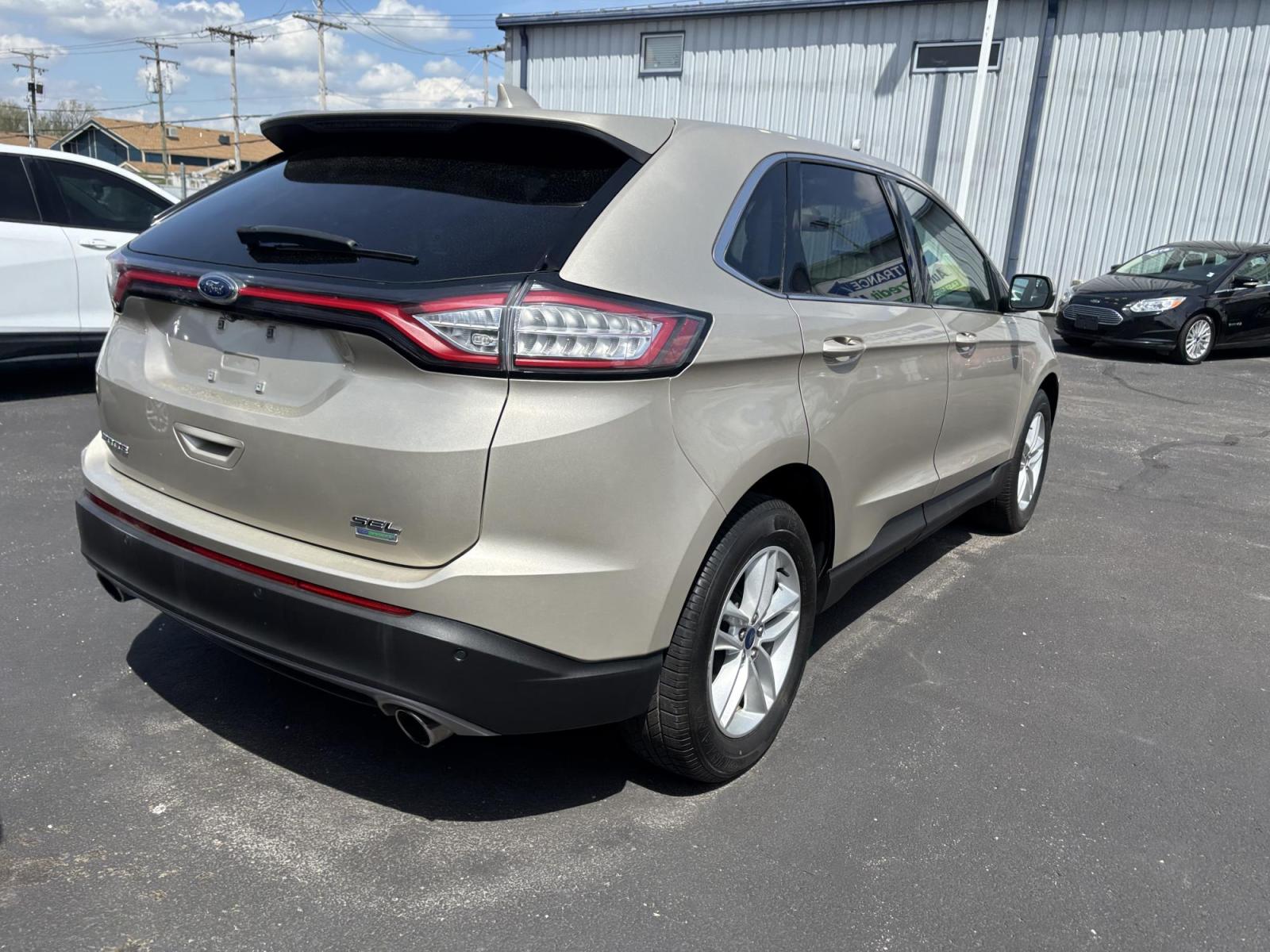 2017 GOLD Ford EDGE SEL (2FMPK3J93HB) with an Other engine, located at 100 West Coliseum Boulevard, Fort Wayne, IN, 46805, (260) 471-0567, 41.119961, -85.140312 - 2017 Ford EDGE SEL - Photo#3