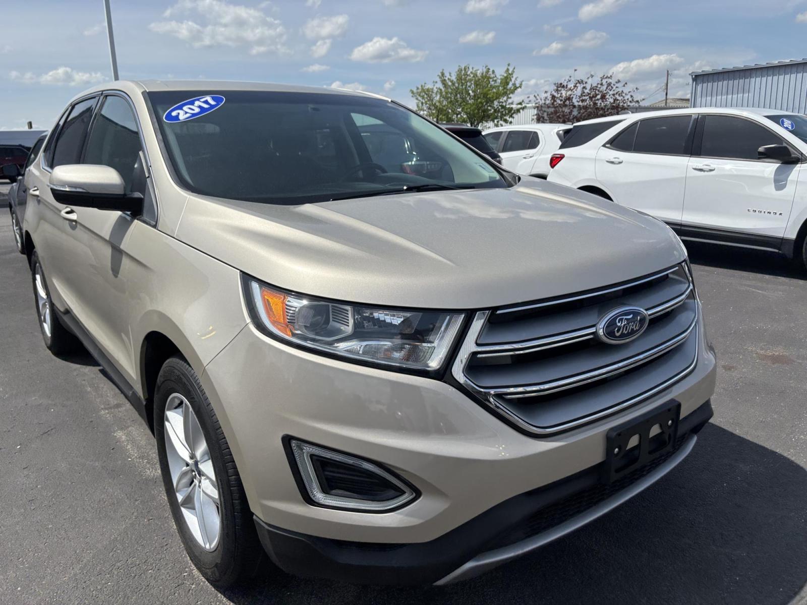 2017 GOLD Ford EDGE SEL (2FMPK3J93HB) with an Other engine, located at 100 West Coliseum Boulevard, Fort Wayne, IN, 46805, (260) 471-0567, 41.119961, -85.140312 - 2017 Ford EDGE SEL - Photo#0