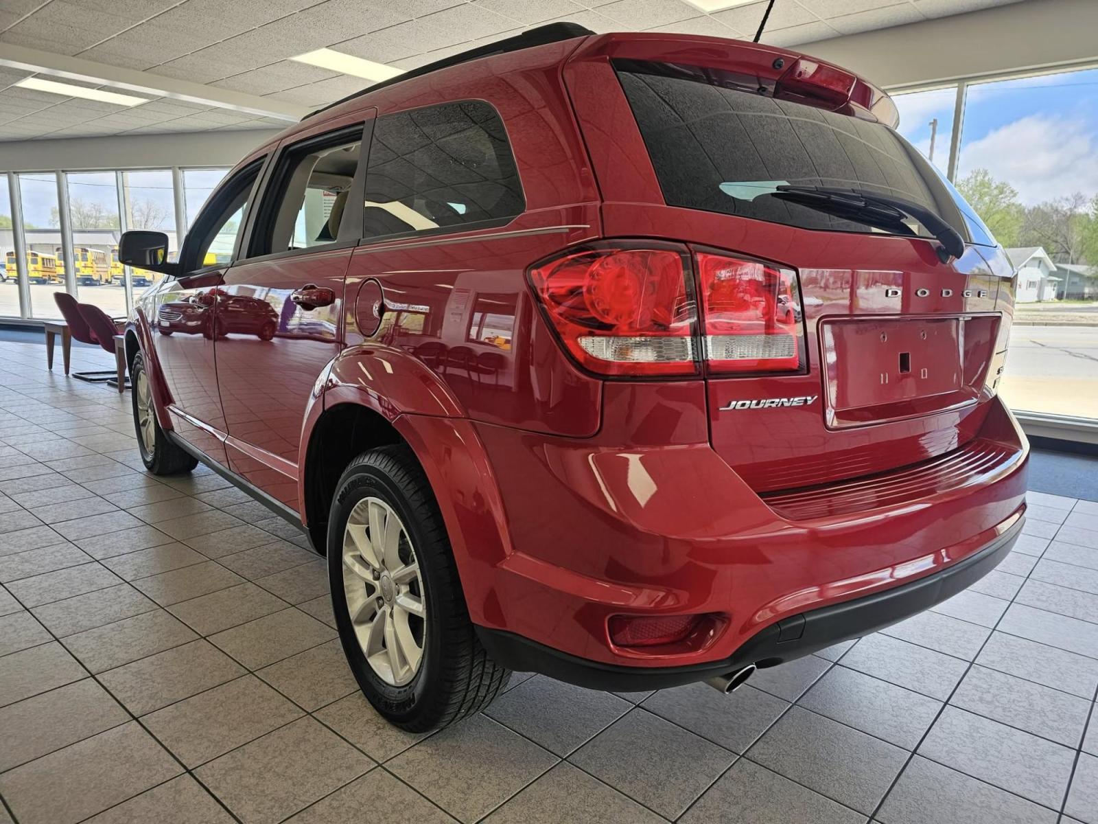 2017 RED /TAN Dodge Journey SXT (3C4PDCBG0HT) with an 3.6L V6 DOHC 24V engine, 4A transmission, located at 502 South Main Street, Columbia City, IN, 46725, (260) 244-4645, 41.151382, -85.490578 - Photo#3