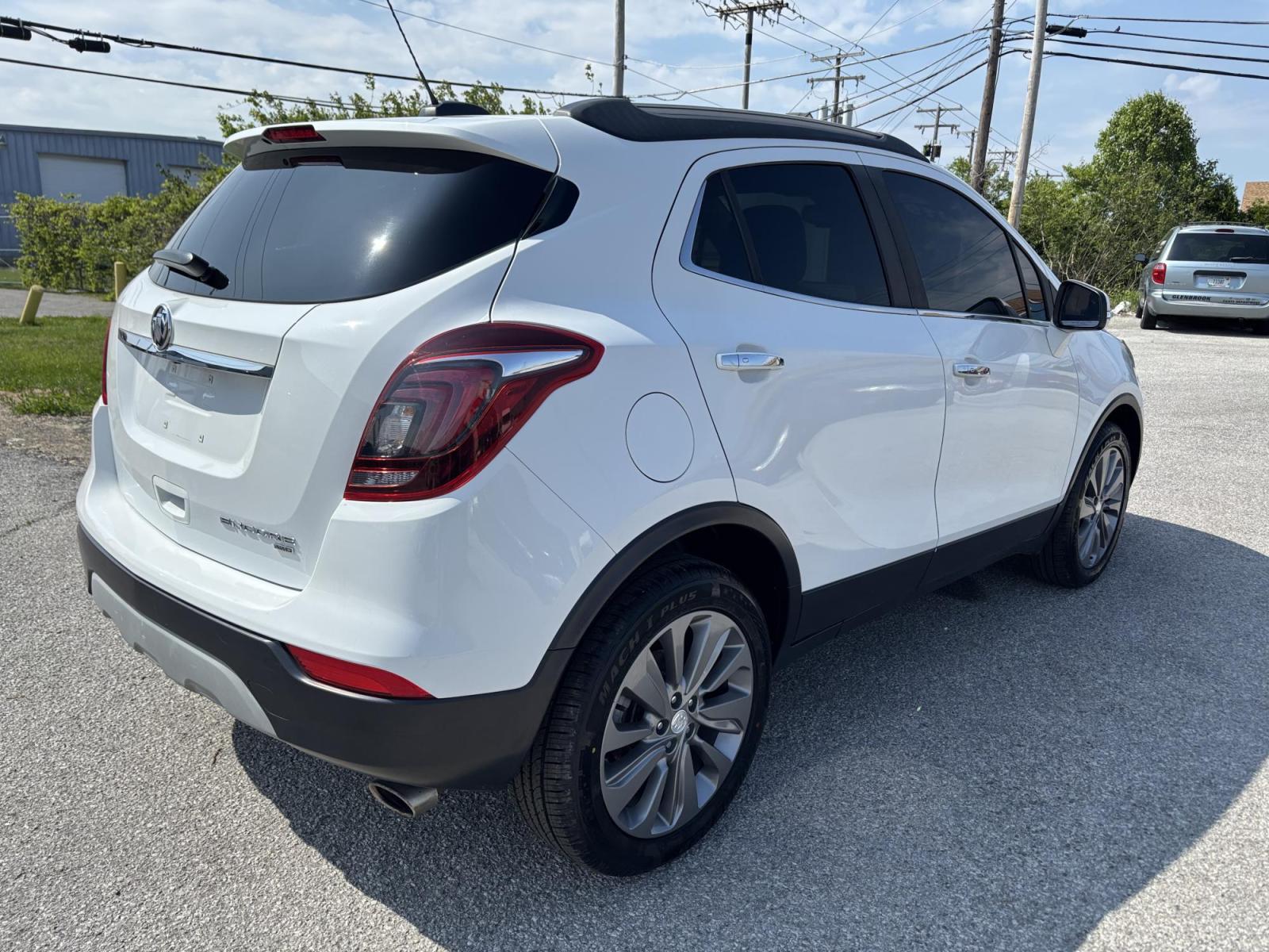 2019 WHITE /black Buick Encore Essence AWD (KL4CJGSMXKB) with an 1.4L L4 DOHC 16V TURBO engine, 6A transmission, located at 100 West Coliseum Boulevard, Fort Wayne, IN, 46805, (260) 471-0567, 41.119961, -85.140312 - Photo#4