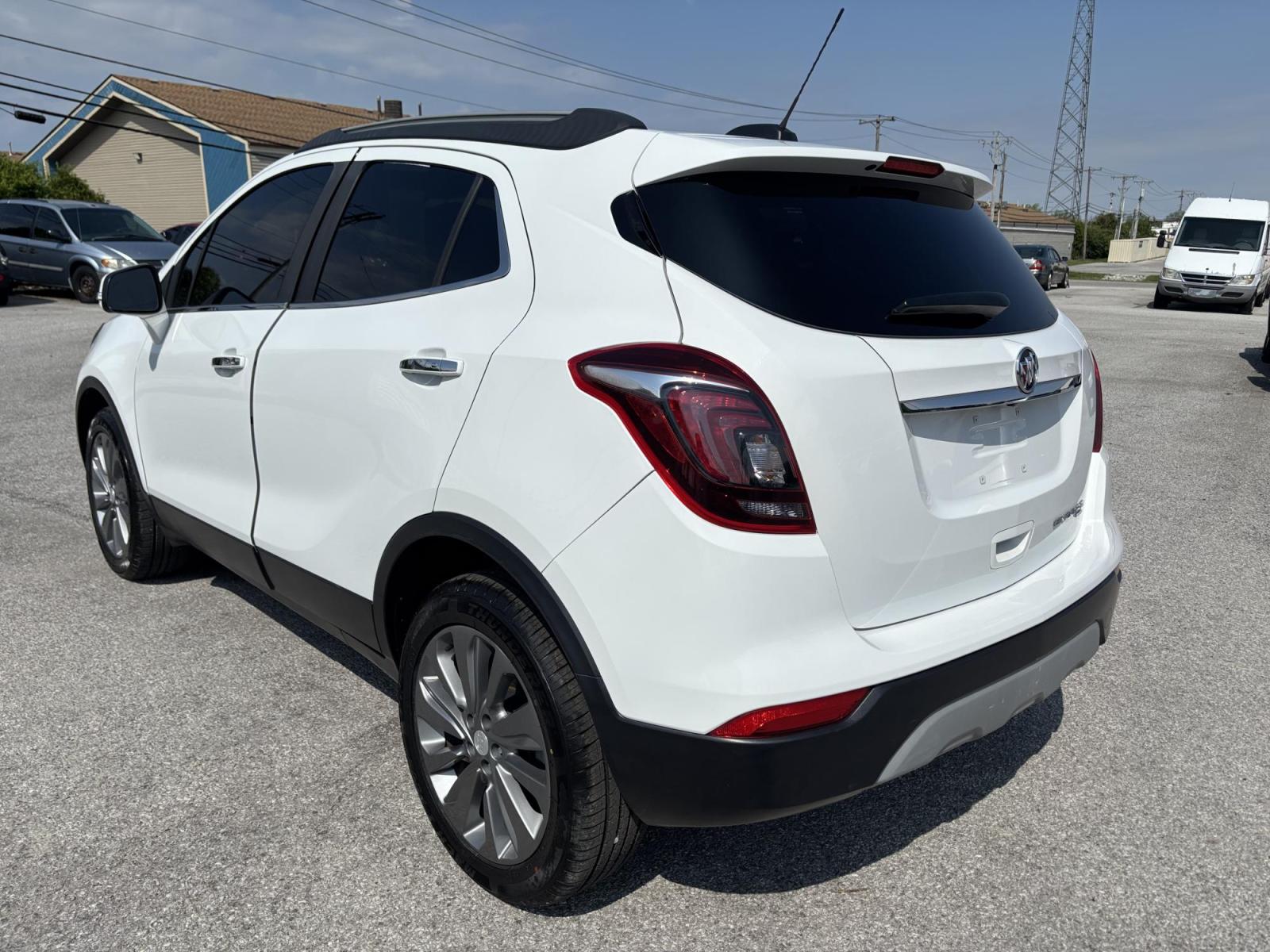 2019 WHITE /black Buick Encore Essence AWD (KL4CJGSMXKB) with an 1.4L L4 DOHC 16V TURBO engine, 6A transmission, located at 100 West Coliseum Boulevard, Fort Wayne, IN, 46805, (260) 471-0567, 41.119961, -85.140312 - Photo#7