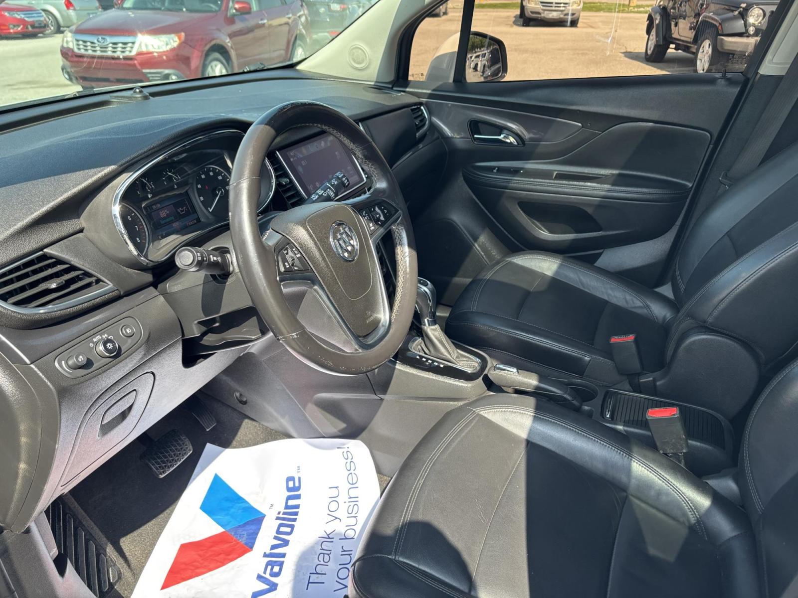 2019 WHITE /black Buick Encore Essence AWD (KL4CJGSMXKB) with an 1.4L L4 DOHC 16V TURBO engine, 6A transmission, located at 100 West Coliseum Boulevard, Fort Wayne, IN, 46805, (260) 471-0567, 41.119961, -85.140312 - Photo#9