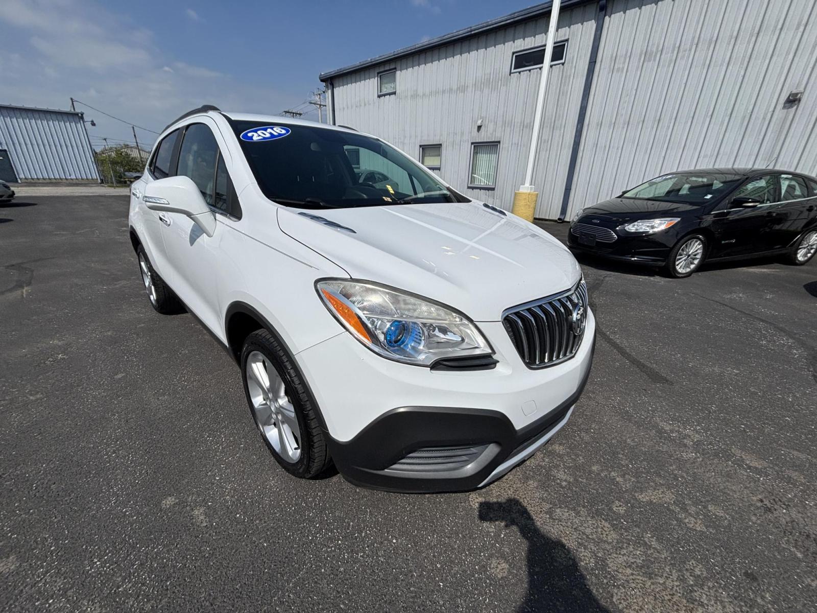 2016 WHITE /black Buick Encore Base FWD (KL4CJASB2GB) with an 1.4L L4 DOHC 16V TURBO engine, 6A transmission, located at 100 West Coliseum Boulevard, Fort Wayne, IN, 46805, (260) 471-0567, 41.119961, -85.140312 - Photo#0