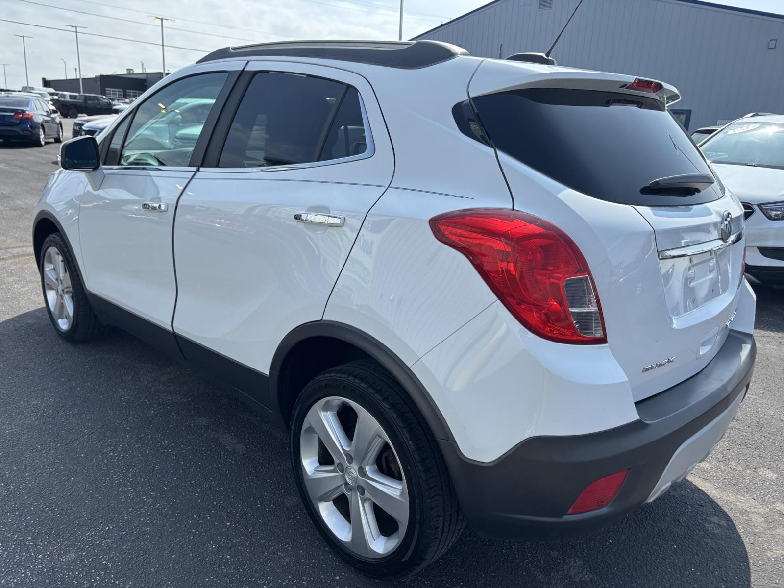 2016 WHITE /black Buick Encore Base FWD (KL4CJASB2GB) with an 1.4L L4 DOHC 16V TURBO engine, 6A transmission, located at 100 West Coliseum Boulevard, Fort Wayne, IN, 46805, (260) 471-0567, 41.119961, -85.140312 - Photo#1