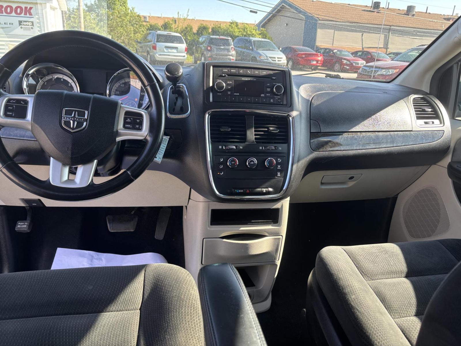 2016 BLUE /Black Dodge Grand Caravan SE (2C4RDGBGXGR) with an 3.6L V6 DOHC 24V engine, 6A transmission, located at 100 West Coliseum Boulevard, Fort Wayne, IN, 46805, (260) 471-0567, 41.119961, -85.140312 - Photo#8
