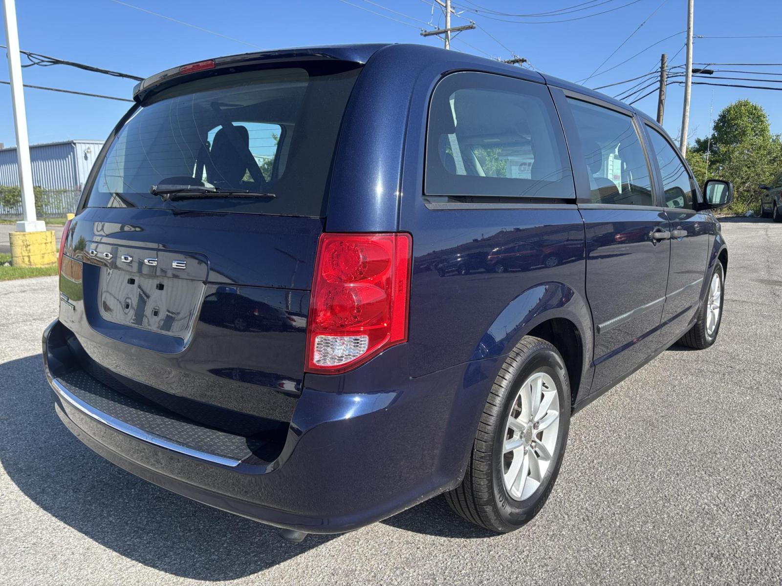 2016 BLUE /Black Dodge Grand Caravan SE (2C4RDGBGXGR) with an 3.6L V6 DOHC 24V engine, 6A transmission, located at 100 West Coliseum Boulevard, Fort Wayne, IN, 46805, (260) 471-0567, 41.119961, -85.140312 - Photo#3