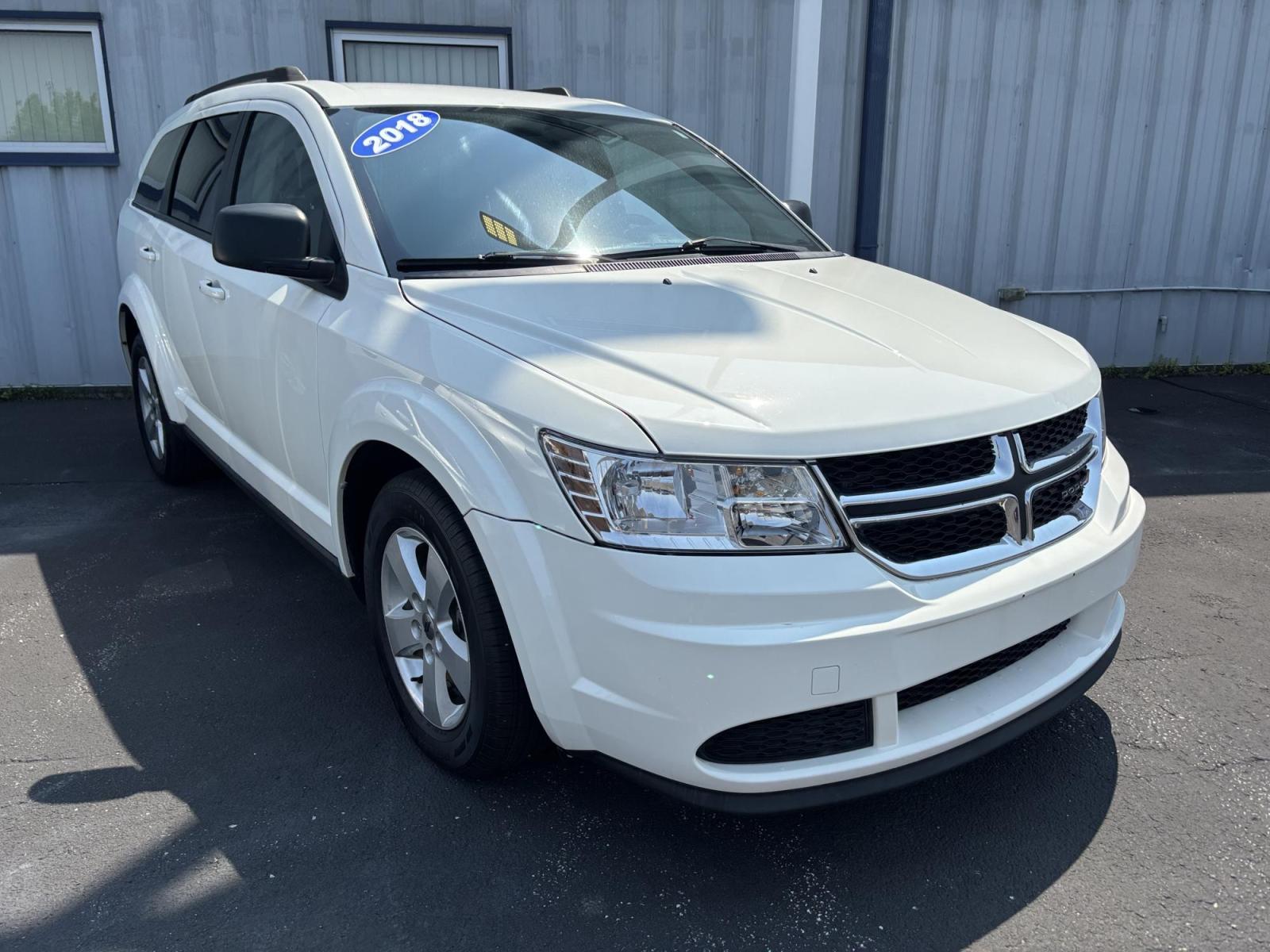 2018 Dodge JOURNEY SE (3C4PDCAB2JT) with an Other engine, located at 100 West Coliseum Boulevard, Fort Wayne, IN, 46805, (260) 471-0567, 41.119961, -85.140312 - **Discover Adventure with the 2018 Dodge Journey SE at Auto Credit in Fort Wayne, IN!**<br /> <br /> Are you in search of a versatile vehicle that can accommodate your growing family, tackle weekend adventures, or become your trusted daily commuter? Look no further! The 2018 Dodge Journey SE, availa - Photo#0