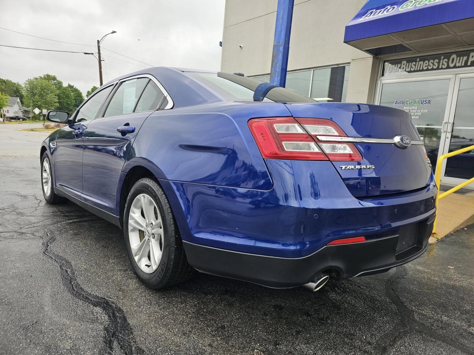 2015 BLUE /BLACK Ford Taurus SEL AWD (1FAHP2H86FG) with an 3.5L V6 DOHC 24V engine, 6-Speed Automatic transmission, located at 502 South Main Street, Columbia City, IN, 46725, (260) 244-4645, 41.151382, -85.490578 - Photo#3