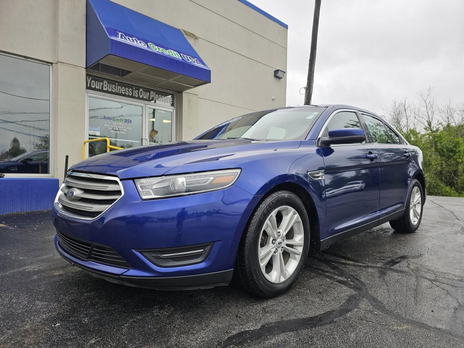 2015 BLUE /BLACK Ford Taurus SEL AWD (1FAHP2H86FG) with an 3.5L V6 DOHC 24V engine, 6-Speed Automatic transmission, located at 502 South Main Street, Columbia City, IN, 46725, (260) 244-4645, 41.151382, -85.490578 - Photo#0