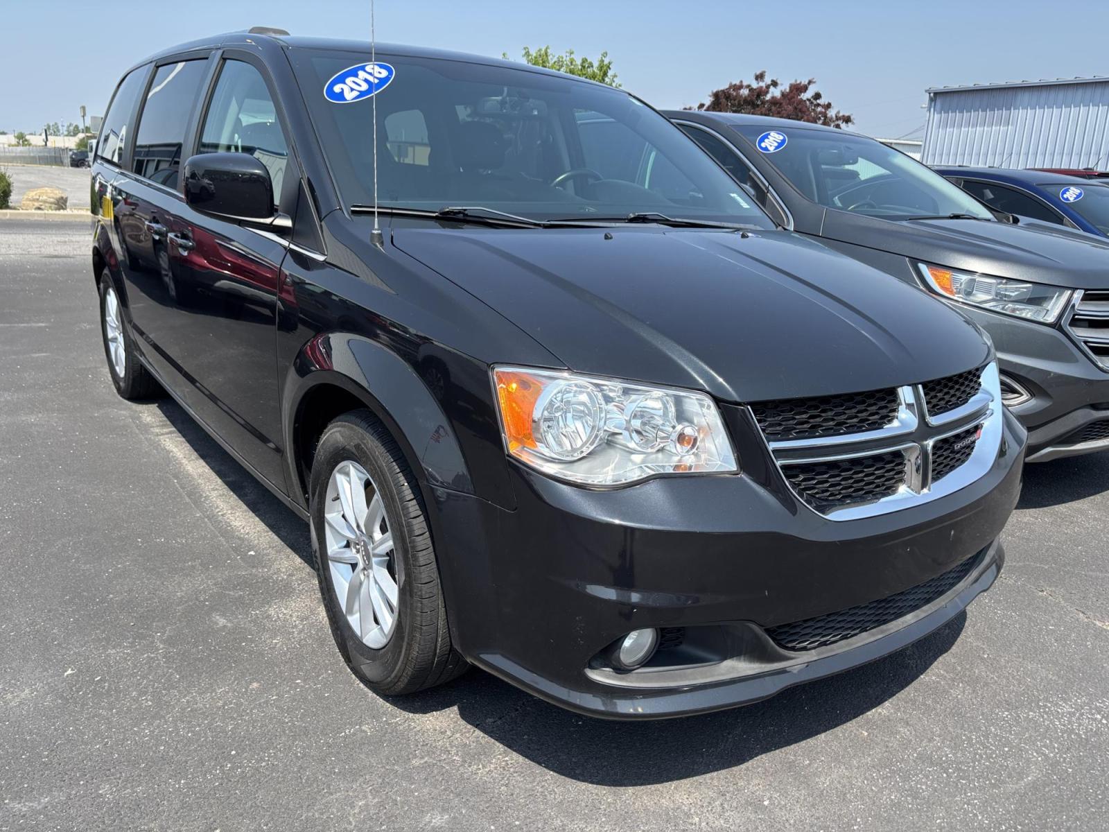 2018 Dodge Grand Caravan (2C4RDGCG1JR) with an Other engine, located at 100 West Coliseum Boulevard, Fort Wayne, IN, 46805, (260) 471-0567, 41.119961, -85.140312 - **Drive Your Family Adventures with This 2018 Dodge Grand Caravan SXT in Fort Wayne!**<br /> <br /> Are you a growing family looking for the perfect vehicle to accommodate weekend getaways, school runs, and everything in between? The 2018 Dodge Grand Caravan SXT is the ultimate family van that offer - Photo#0