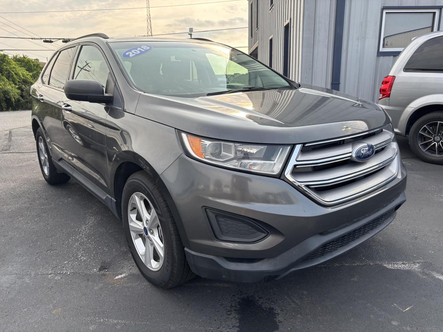 2018 GRAY Ford Edge (2FMPK3G93JB) with an Other engine, located at 100 West Coliseum Boulevard, Fort Wayne, IN, 46805, (260) 471-0567, 41.119961, -85.140312 - Are you ready to elevate your driving experience while enjoying the reliability of a well-crafted vehicle? Look no further than this stunning 2018 Ford Edge SE, available now at Auto Credit in Fort Wayne, Indiana. With a perfect blend of style, comfort, and utility, this versatile wagon is ideal for - Photo#0