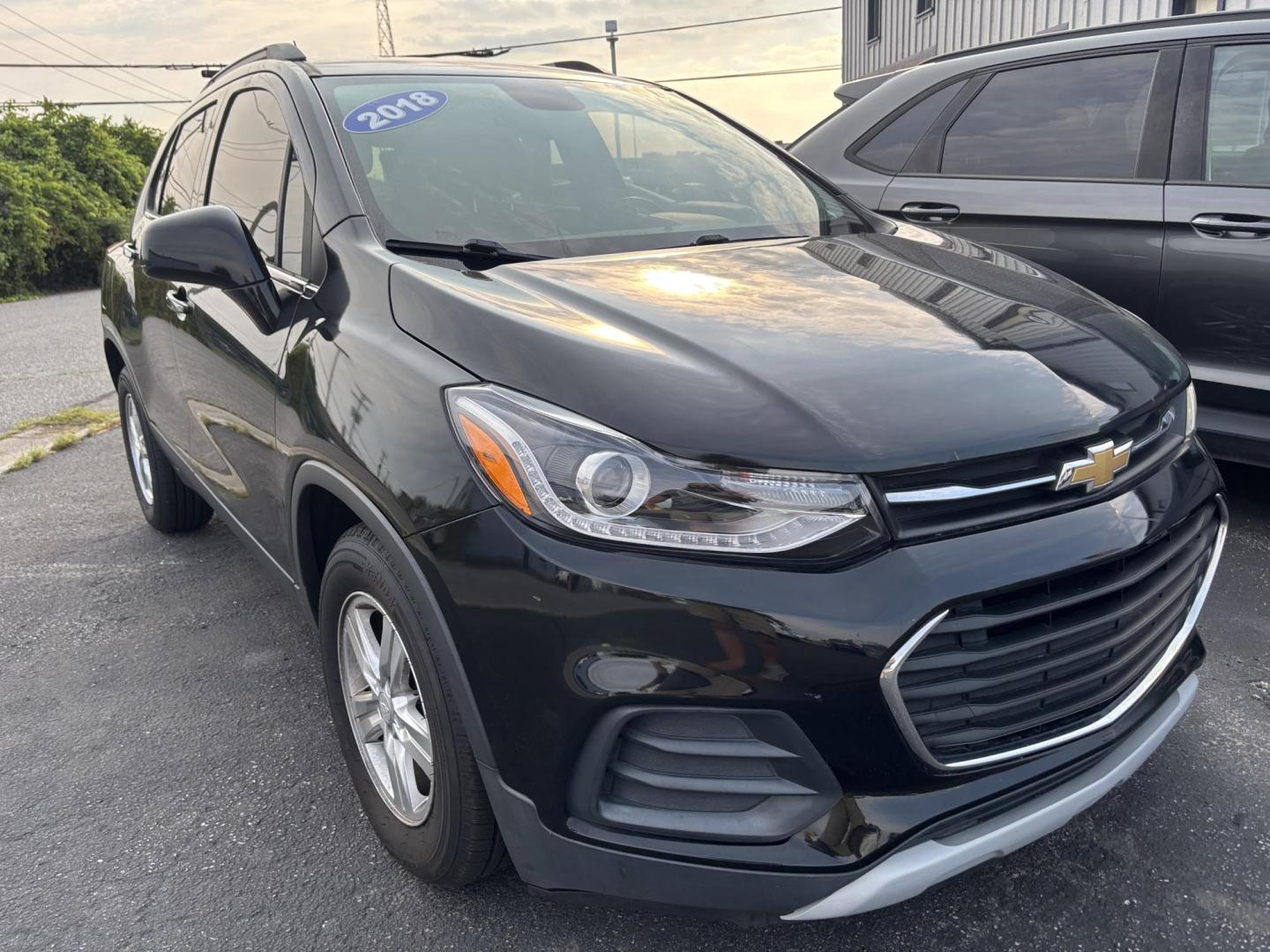 2018 BLACK Chevrolet TRAX 1LT (3GNCJLSB4JL) with an Other engine, located at 100 West Coliseum Boulevard, Fort Wayne, IN, 46805, (260) 471-0567, 41.119961, -85.140312 - **Discover the Perfect City Companion: 2018 Chevrolet Trax 1LT at Auto Credit** <br /> <br /> Are you on the hunt for a versatile and reliable vehicle that fits seamlessly into your daily life? Look no further than this stunning 2018 Chevrolet Trax 1LT, perfect for urban commuting, weekend adventur - Photo#0