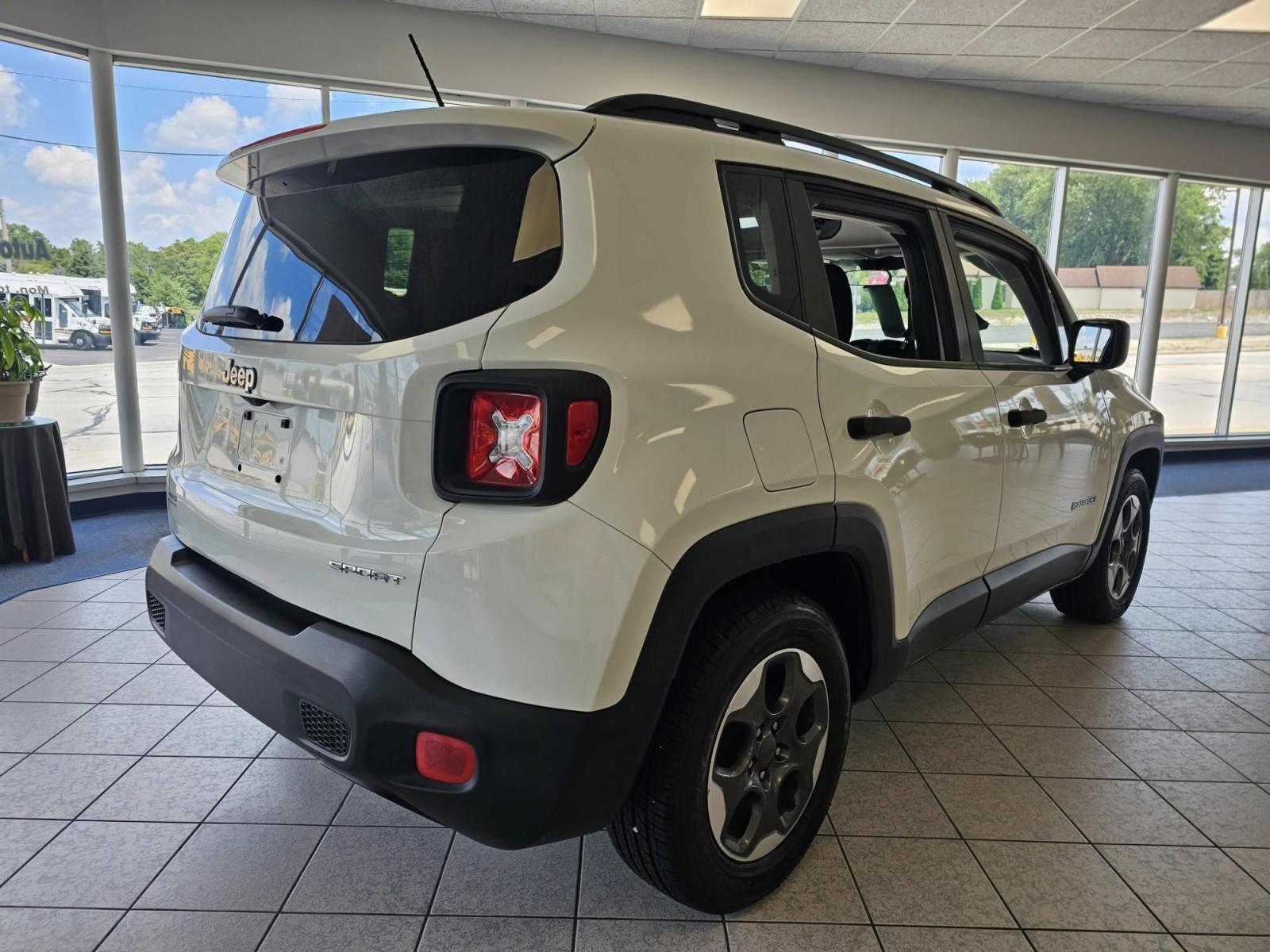 2017 WHITE Jeep Renegade (ZACCJAAB6HP) with an Other engine, located at 502 South Main Street, Columbia City, IN, 46725, (260) 244-4645, 41.151382, -85.490578 - Are you ready to elevate your adventures and redefine your daily commute? Imagine cruising confidently through Columbia City and beyond in a 2017 Jeep Renegade Sport, the perfect blend of rugged capability and urban style. This compact SUV is designed not just for the road, but for life. Whether you - Photo#3
