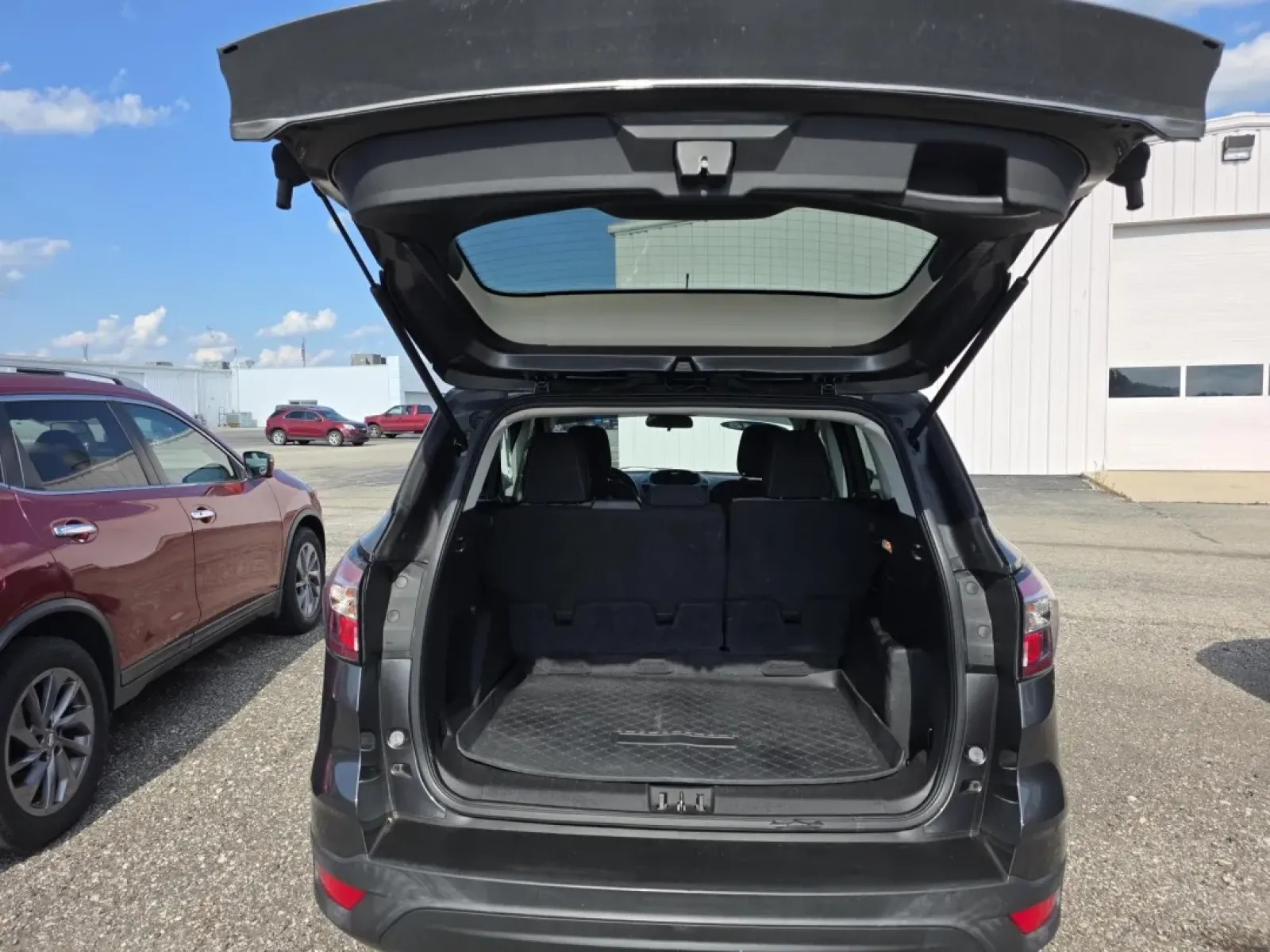 2018 Ford Escape (1FMCU0F79JU) with an Other engine, located at 15 Petro Dr, Warsaw, IN, 46582, (574) 306-0055, 41.273563, -85.857544 - **Explore the Open Road with the 2018 Ford Escape: Your Perfect Adventure Awaits!**<br /> <br /> Are you ready for your next adventure, whether it's a weekend getaway or a daily commute? Look no further than the 2018 Ford Escape, a versatile SUV that perfectly balances style, comfort, and performanc - Photo#6