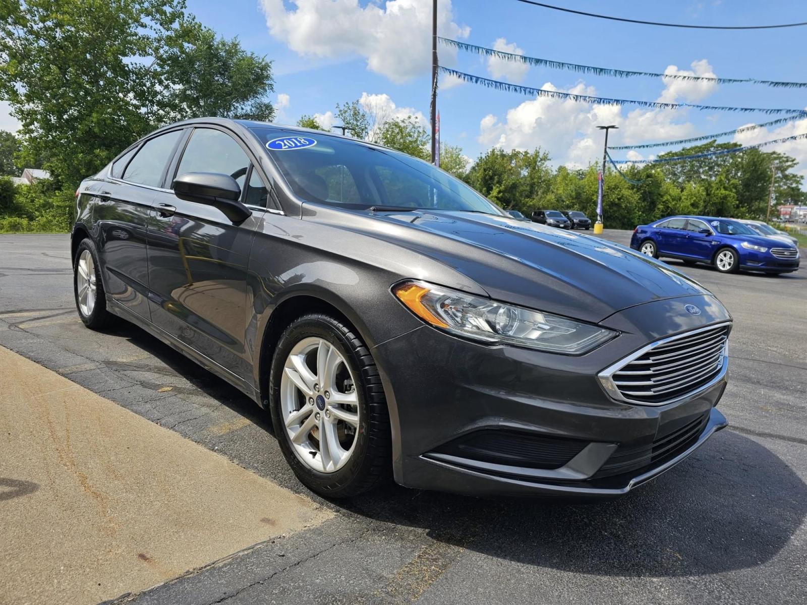 2018 Ford FUSION SE (3FA6P0H7XJR) with an Other engine, located at 502 South Main Street, Columbia City, IN, 46725, (260) 244-4645, 41.151382, -85.490578 - **Discover Your Perfect Sedan for Daily Adventures: 2018 Ford Fusion SE in Columbia City, IN**<br /> <br /> Are you in search of a stylish and reliable vehicle that fits seamlessly into your daily life? Look no further than this 2018 Ford Fusion SE, ideal for anyone from busy commuters to growing fa - Photo#1