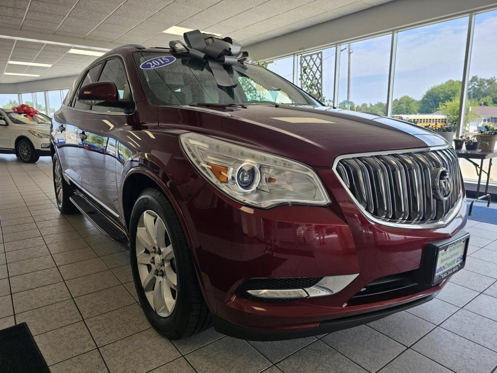 2015 RED Buick Enclave (5GAKRCKD9FJ) with an Other engine, located at 502 South Main Street, Columbia City, IN, 46725, (260) 244-4645, 41.151382, -85.490578 - Are you ready to elevate your family adventures? The 2015 Buick Enclave is the ideal SUV for growing families and those who love to travel with comfort and style. With spacious seating, advanced safety features, and a smooth ride, this vehicle is perfect for family road trips or daily commutes in an - Photo#0