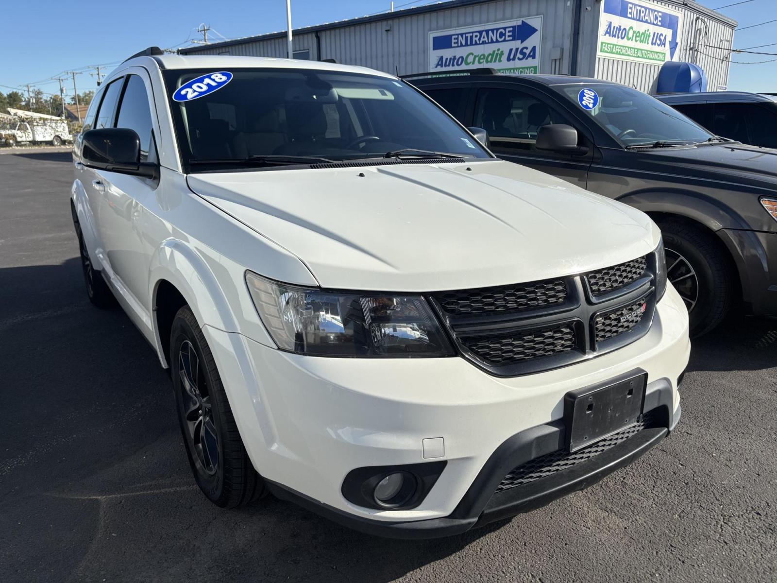 2018 SILVER Dodge Journey (3C4PDCBG0JT) with an Other engine, located at 100 West Coliseum Boulevard, Fort Wayne, IN, 46805, (260) 471-0567, 41.119961, -85.140312 - **Discover Your Next Adventure with the 2018 Dodge Journey at Auto Credit!**<br /> <br /> Are you ready to hit the road with your family, friends, or just for a solo escape? The 2018 Dodge Journey is the perfect companion for your lifestyle, whether you're planning a weekend getaway, diving into dai - Photo#0