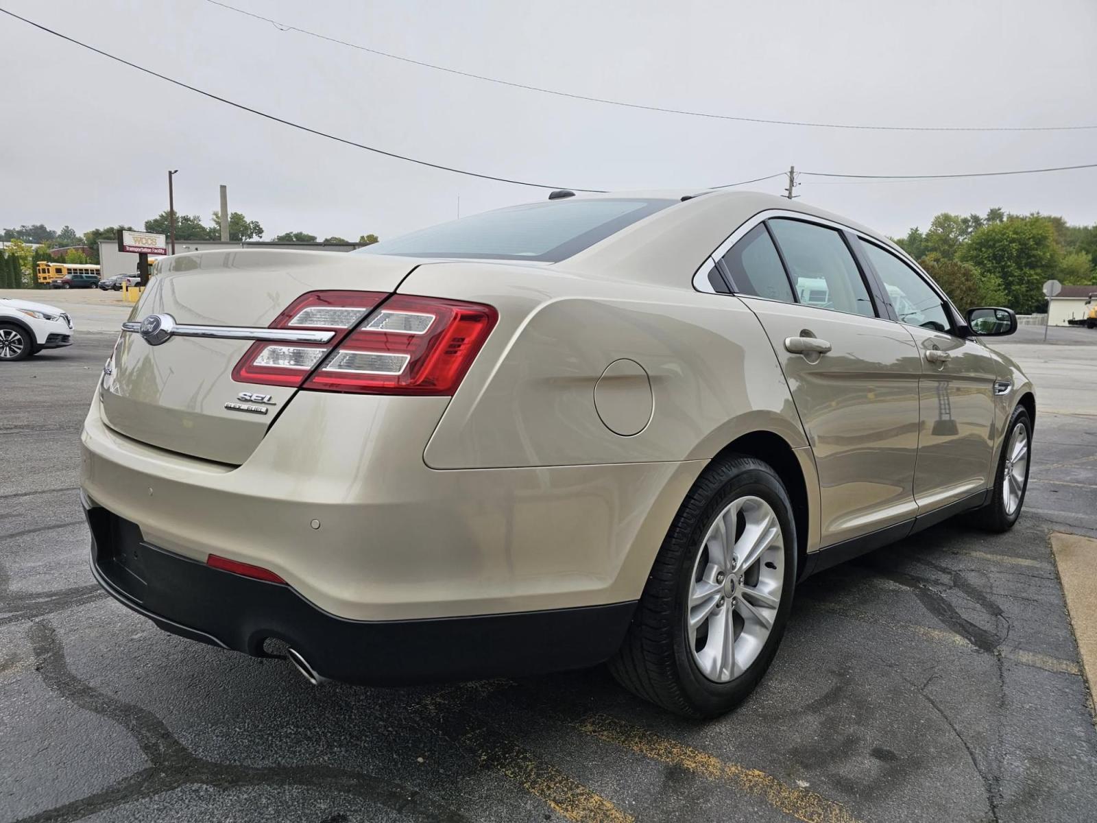 2017 GOLD Ford Taurus (1FAHP2E81HG) with an Other engine, located at 502 South Main Street, Columbia City, IN, 46725, (260) 244-4645, 41.151382, -85.490578 - Are you in the market for a reliable sedan that seamlessly fits into your busy lifestyle? Whether you're commuting to work, running errands, or embarking on weekend adventures, the 2017 Ford Taurus is an excellent choice for those seeking comfort, style, and performance. This spacious sedan is perfe - Photo#3