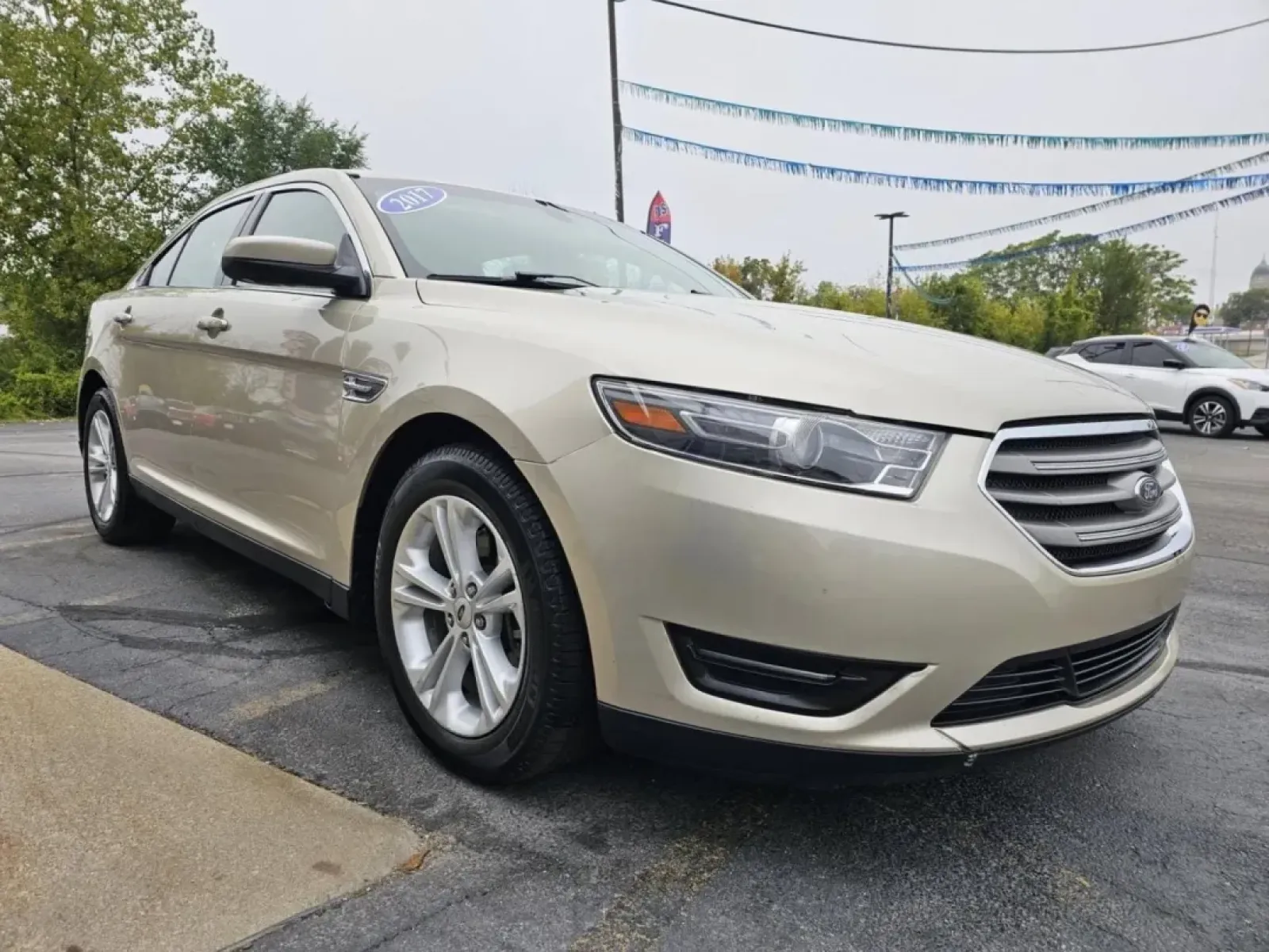 2017 GOLD Ford Taurus (1FAHP2E81HG) with an Other engine, located at 502 South Main Street, Columbia City, IN, 46725, (260) 244-4645, 41.151382, -85.490578 - Are you in the market for a reliable sedan that seamlessly fits into your busy lifestyle? Whether you're commuting to work, running errands, or embarking on weekend adventures, the 2017 Ford Taurus is an excellent choice for those seeking comfort, style, and performance. This spacious sedan is perfe - Photo#1
