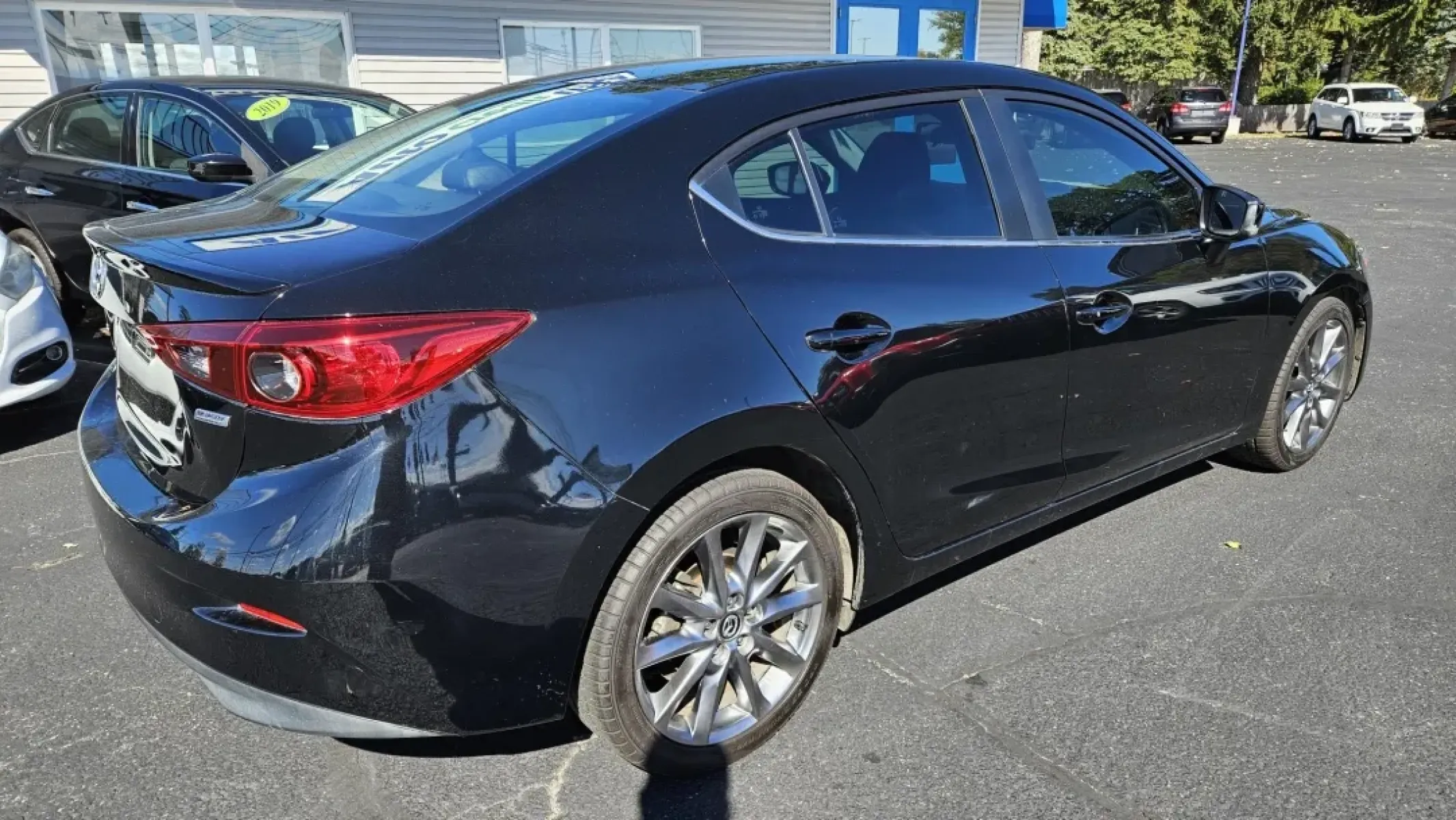 2018 Mazda MAZDA3 TOURING (3MZBN1V30JM) with an Other engine, located at 5744 Central Avenue, Toledo, OH, 43615, (419) 724-0130, 41.676781, -83.682137 - Are you seeking an ideal vehicle for your daily commute or weekend adventures without the pressure of high monthly payments? Look no further than this sleek 2018 Mazda MAZDA3 Touring, available now at Auto Credit in Toledo, OH. Designed for budget-conscious buyers, this sedan combines style, comfort - Photo#3