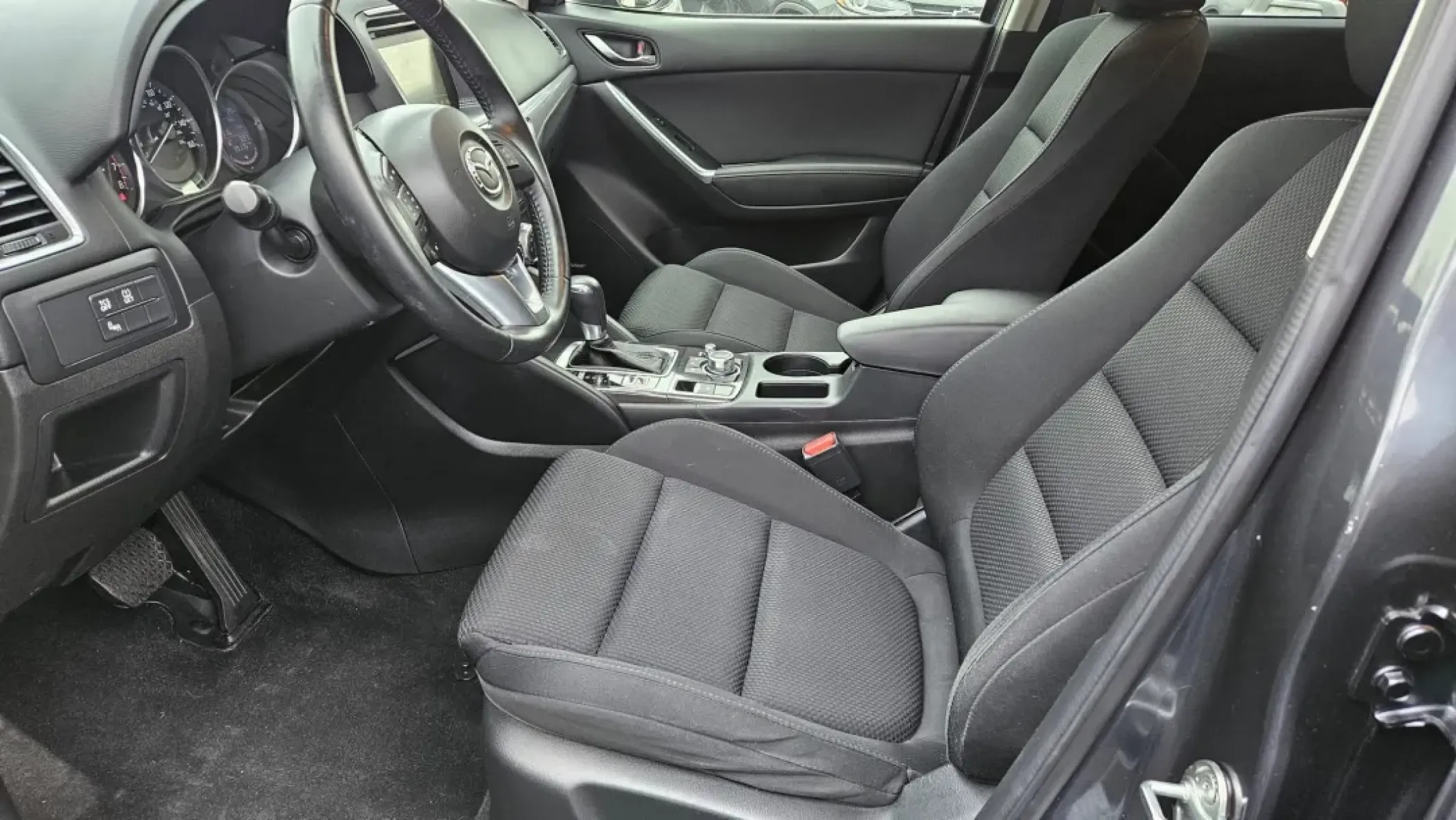 2016 Mazda CX-5 TOURING (JM3KE2CY9G0) with an Other engine, located at 5744 Central Avenue, Toledo, OH, 43615, (419) 724-0130, 41.676781, -83.682137 - Experience life on the move with the 2016 Mazda CX-5 Touring, an SUV designed for those who crave adventure without compromising comfort. Whether you're navigating the busy streets of Toledo or embarking on a weekend getaway to the shores of Lake Erie, this vehicle is perfect for everyone-from growi - Photo#5